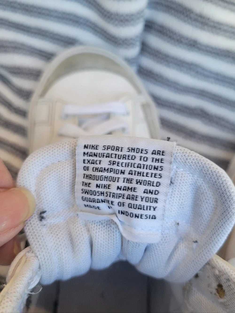 Nike White High-Top Blazers Sneakers with Black Swoosh and Red Tongue Tag